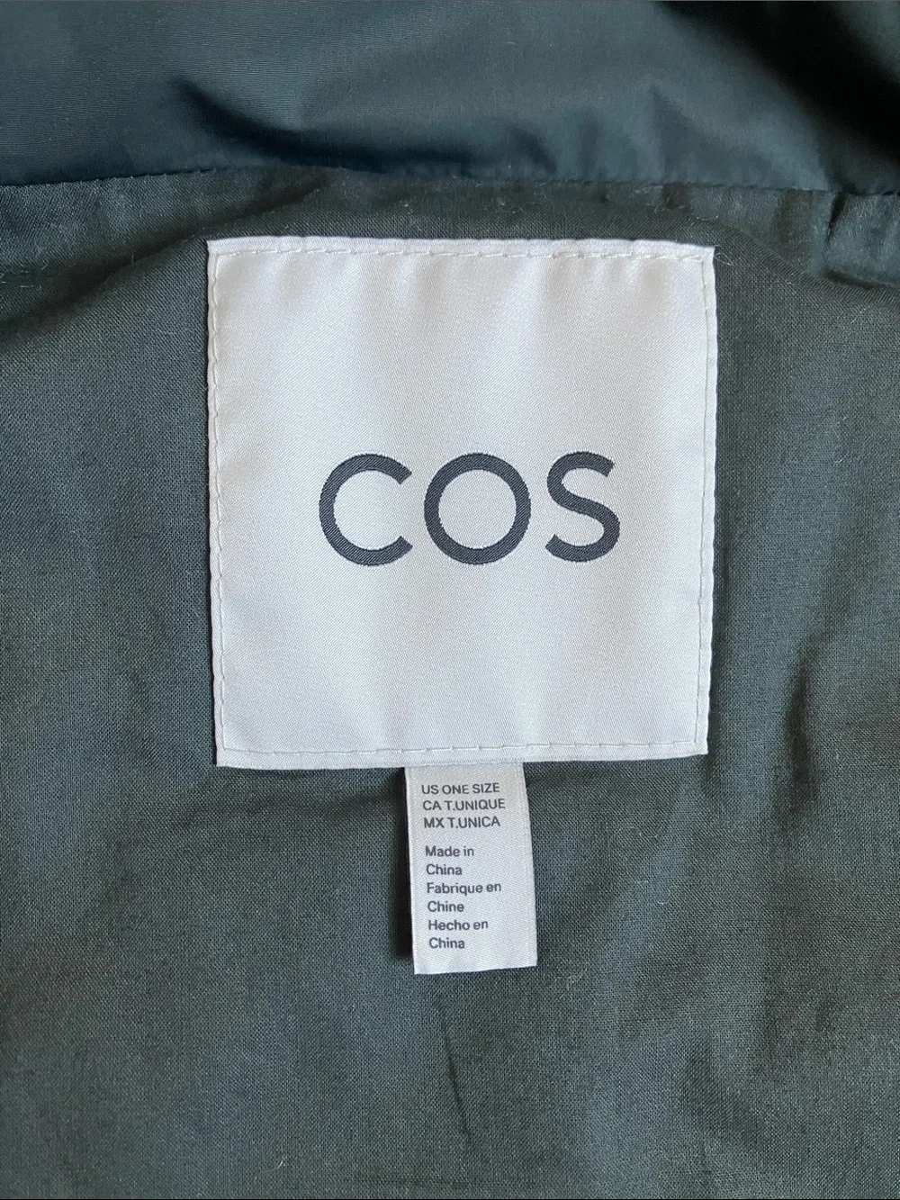dark green COS high-neck padded vest